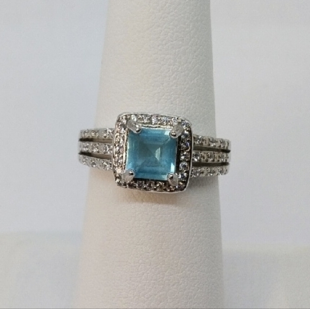 Elegant Blue and Silver Topaz Ring with Diamond Accents